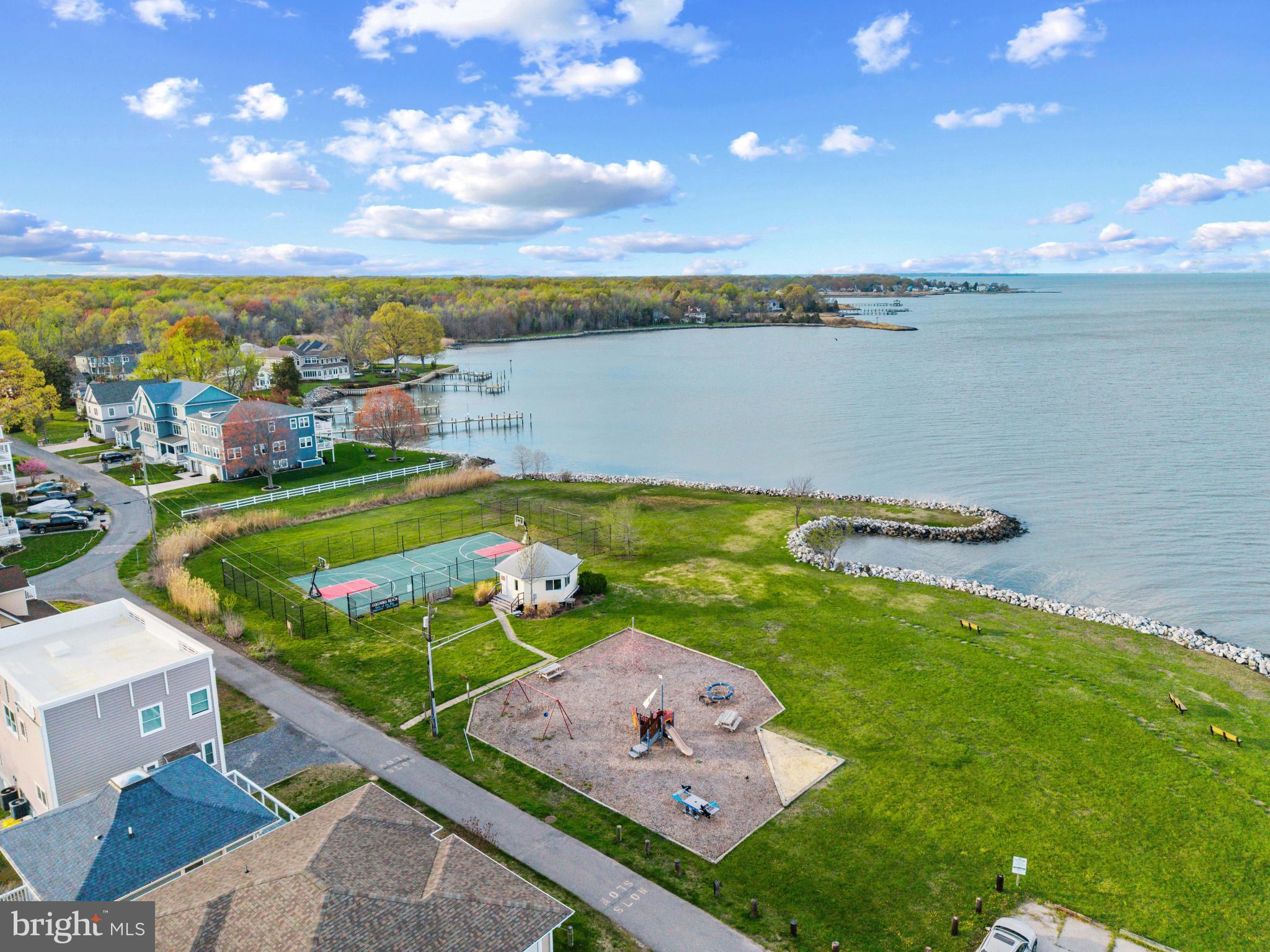 1512 Lincoln Road Shady Side, MD 20764 - Photo 12 of 42 an aerial view of a house with a lake view