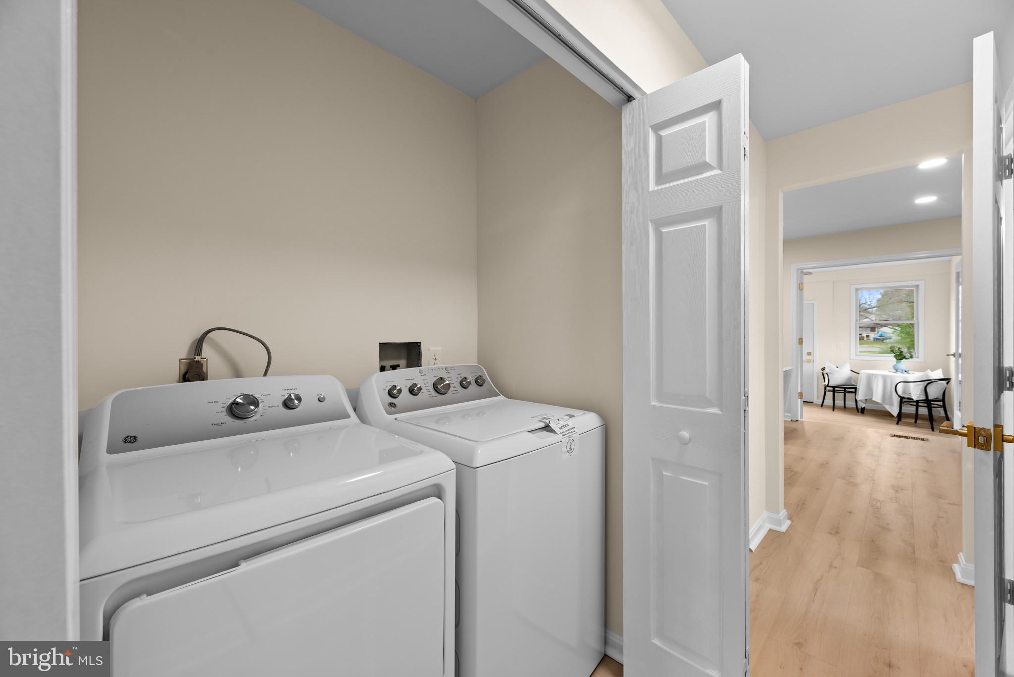 1512 Lincoln Road Shady Side, MD 20764 - Photo 24 of 42 a view of washer and dryer with bathroom in the background