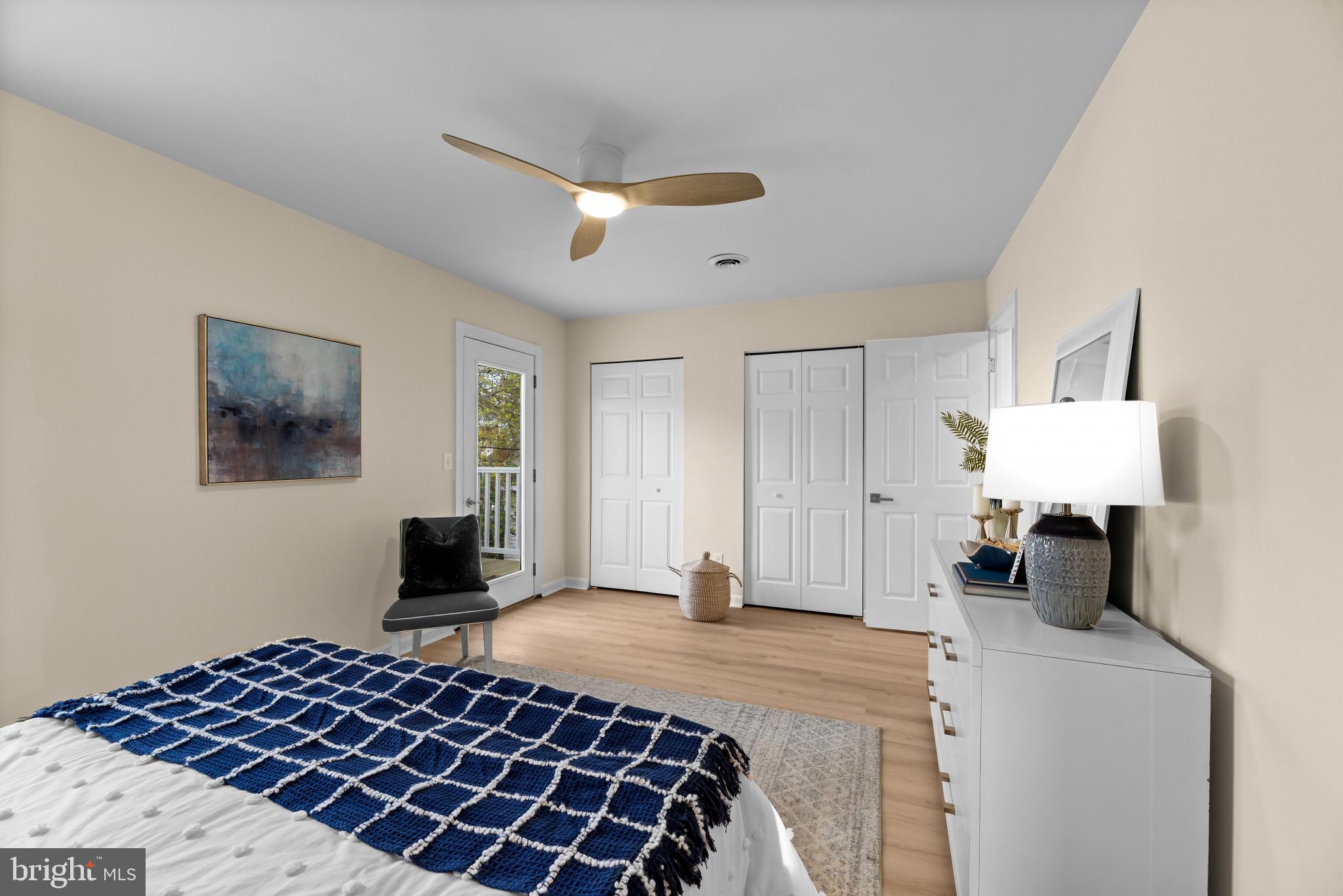 1512 Lincoln Road Shady Side, MD 20764 - Photo 31 of 42 a bedroom with a bed and a lamp