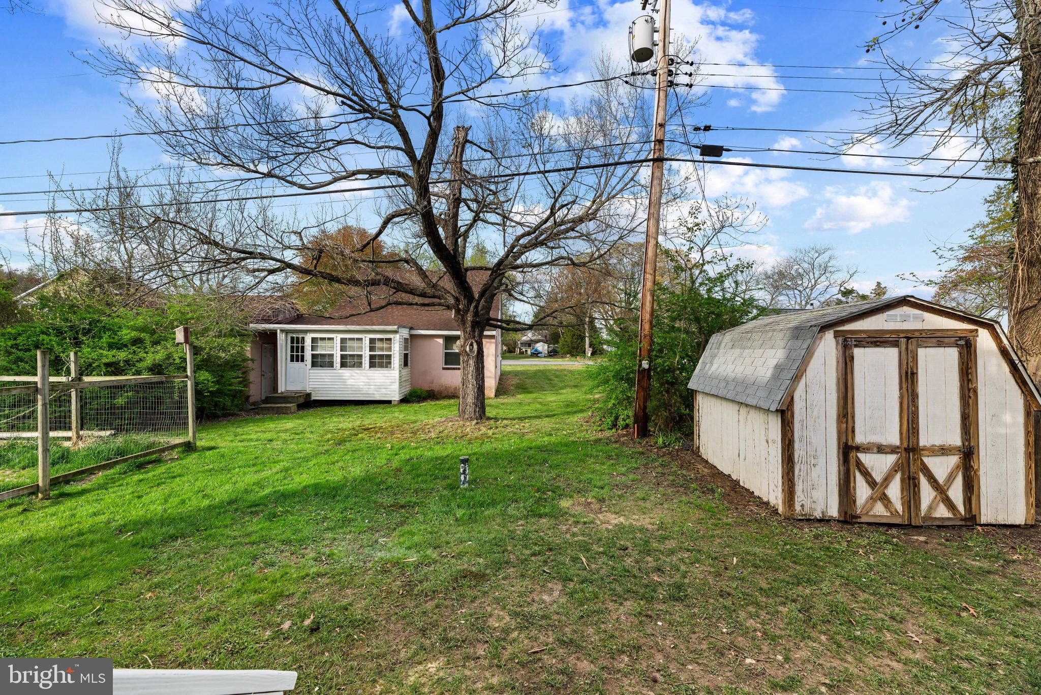 1512 Lincoln Road Shady Side, MD 20764 - Photo 36 of 42 a view of a yard with a house and a park