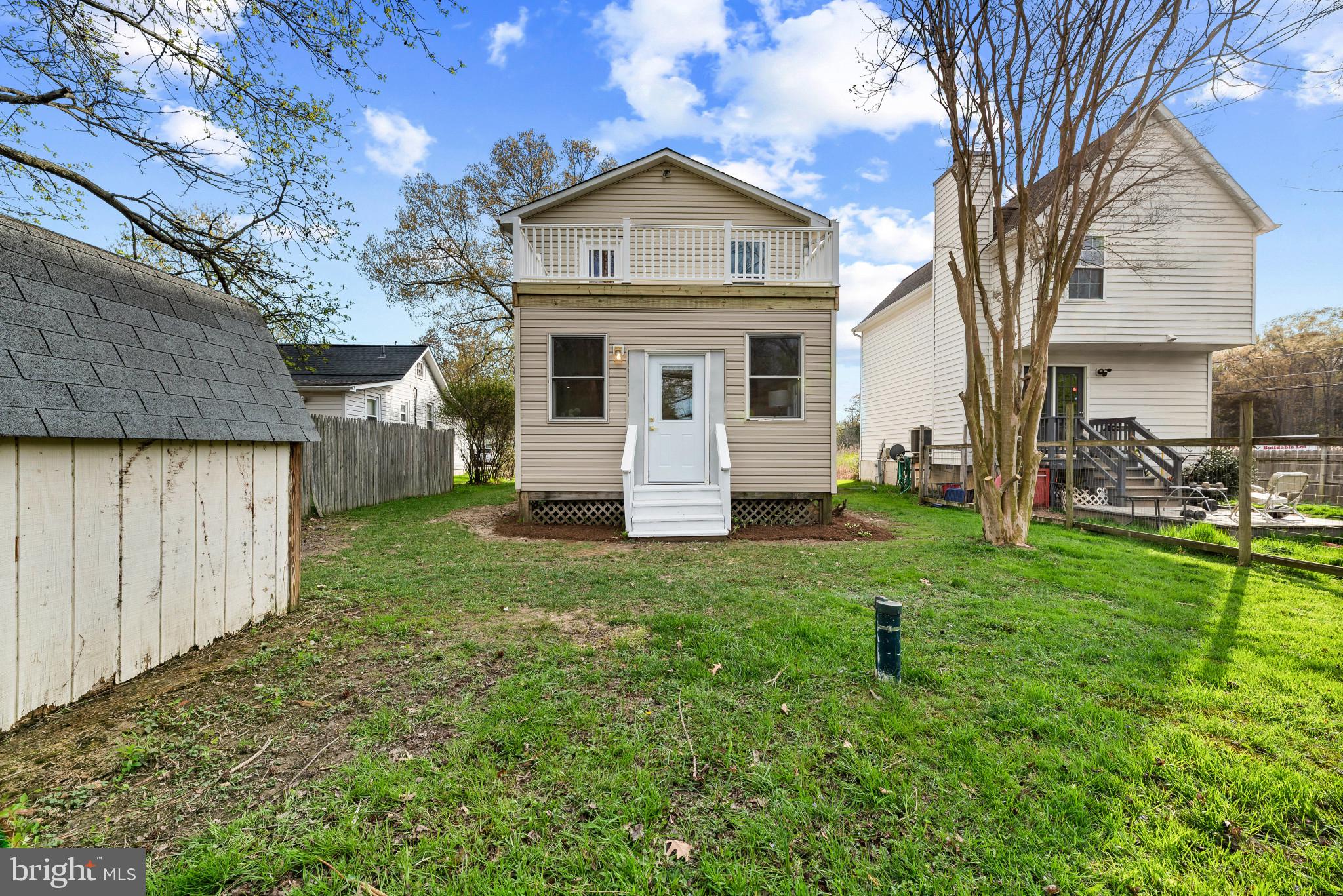 1512 Lincoln Road Shady Side, MD 20764 - Photo 38 of 42 a front view of a house with garden