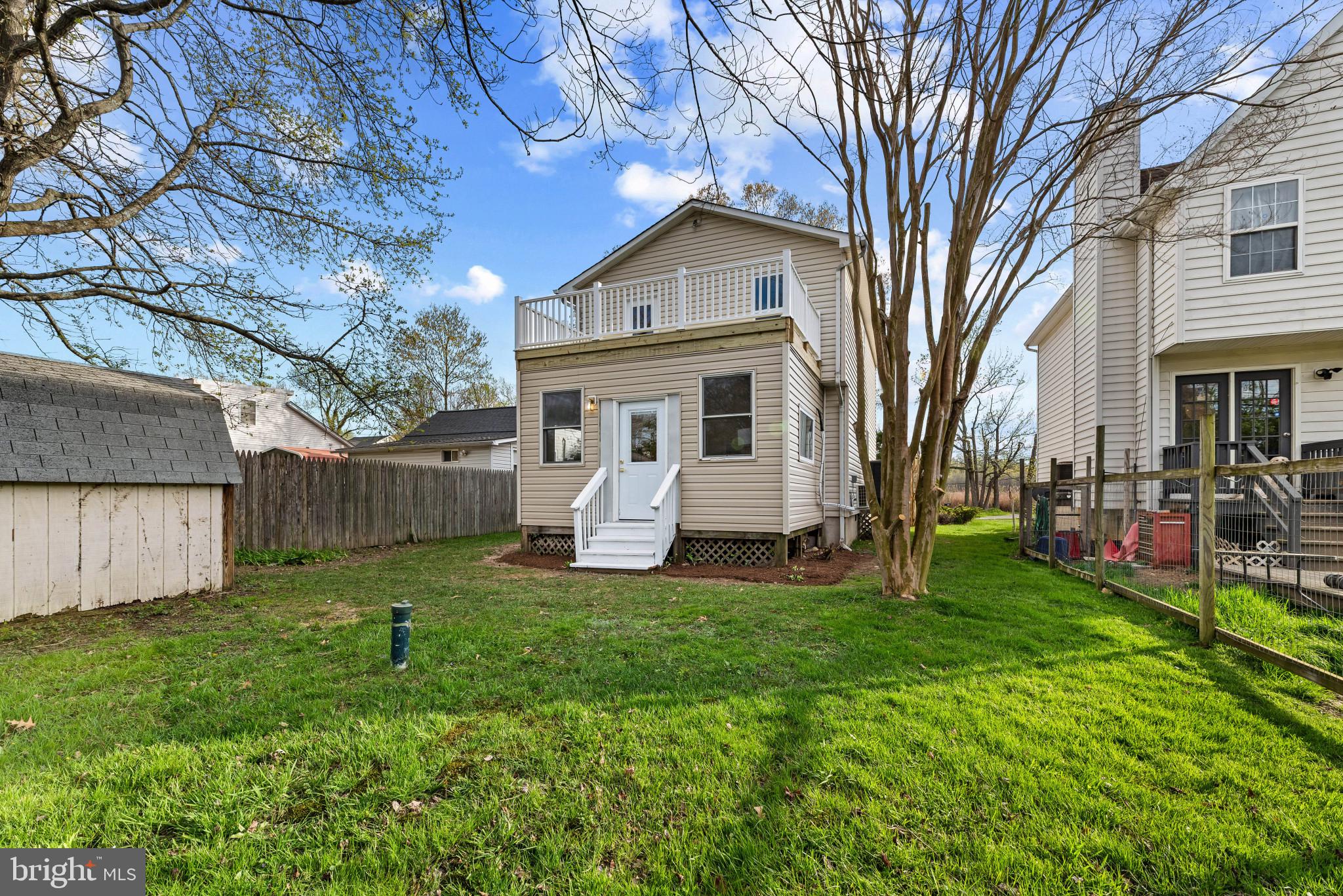 1512 Lincoln Road Shady Side, MD 20764 - Photo 39 of 42 a view of house with a yard