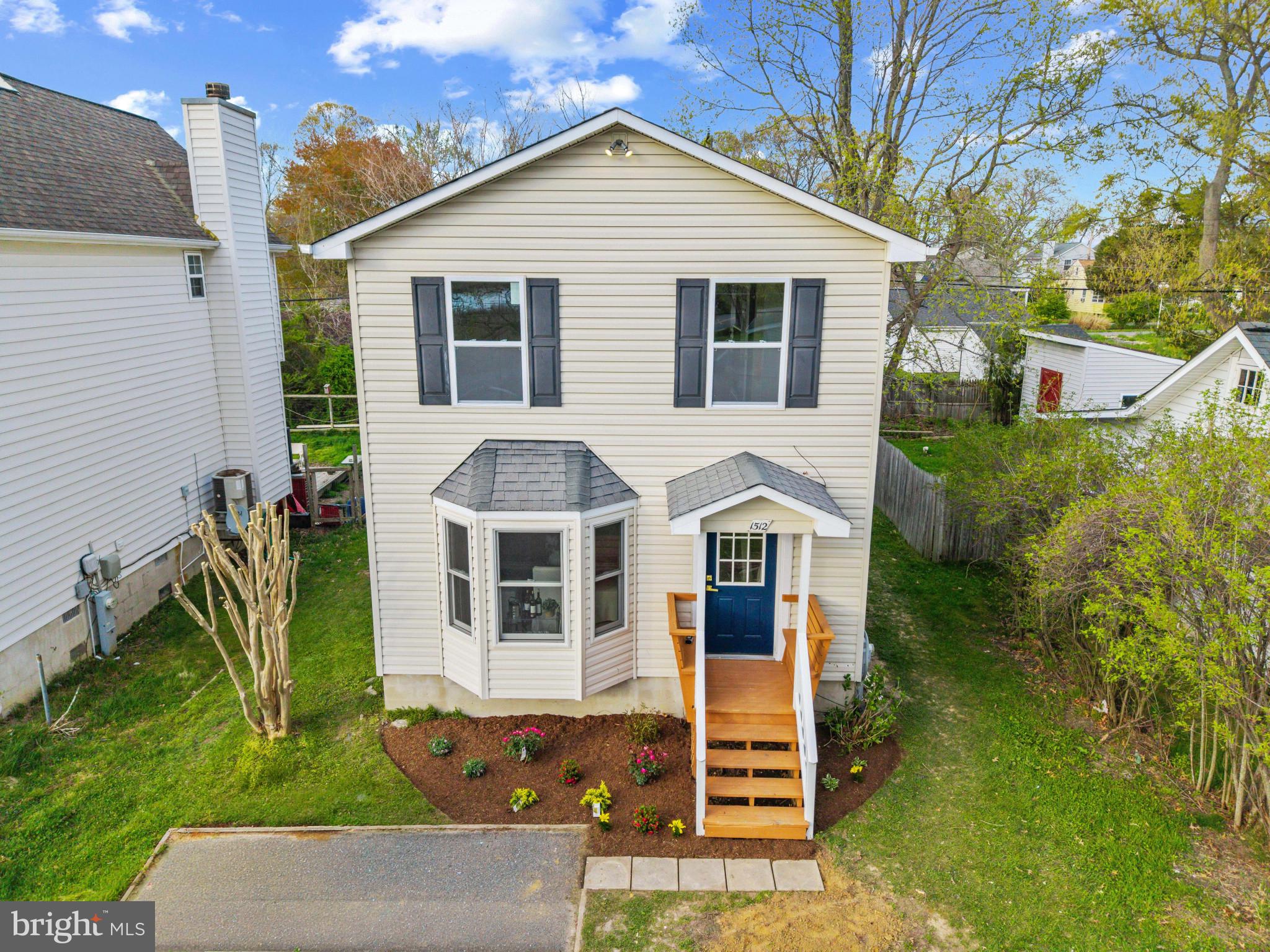 1512 Lincoln Road Shady Side, MD 20764 - Photo 41 of 42 a front view of a house with a yard