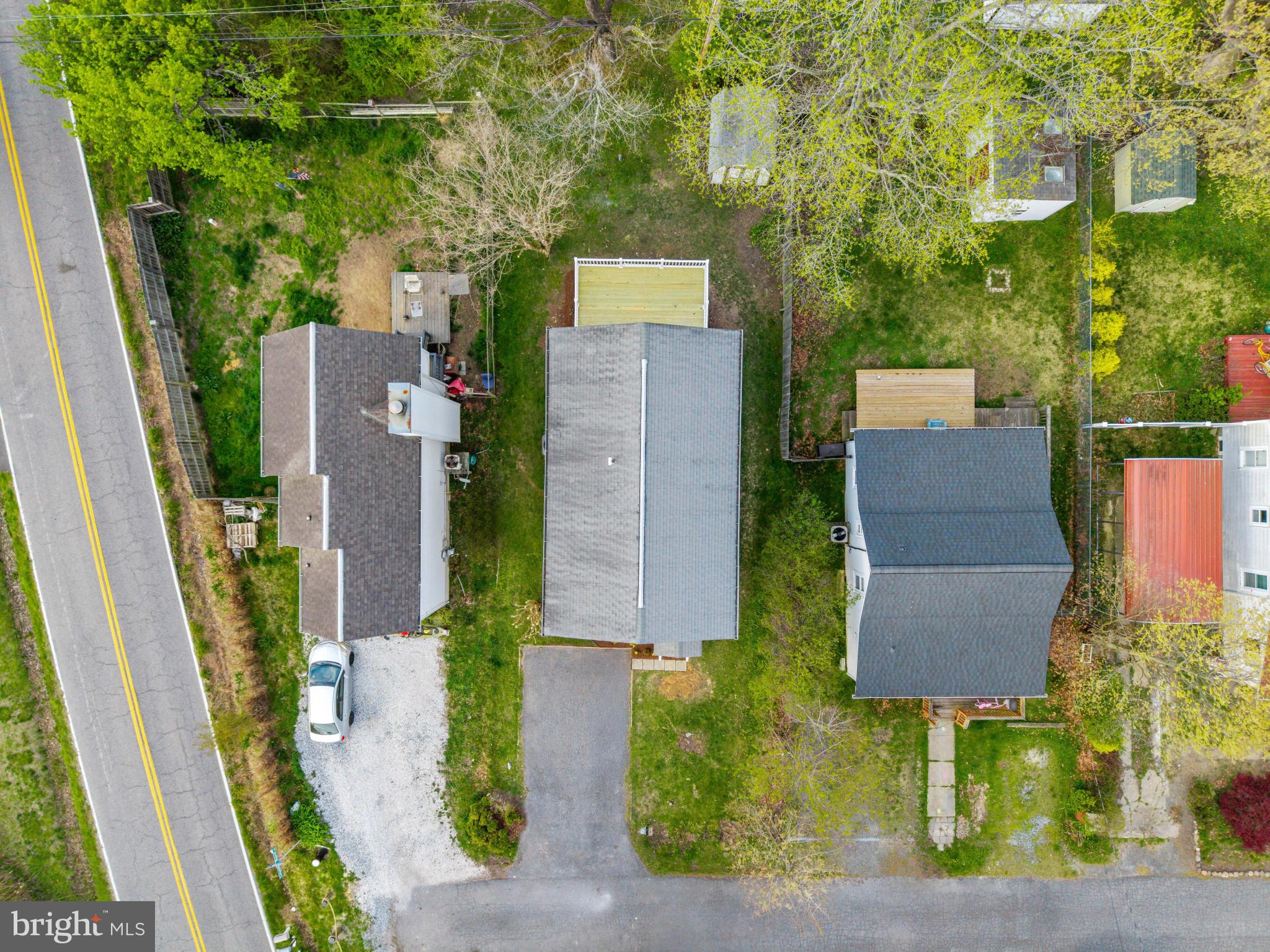 1512 Lincoln Road Shady Side, MD 20764 - Photo 42 of 42 an aerial view of a house with garden space and street view