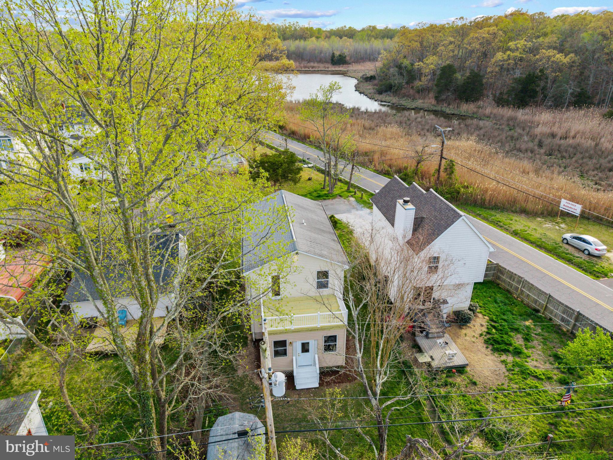 1512 Lincoln Road Shady Side, MD 20764 - Photo 8 of 42 an aerial view of a house with a yard
