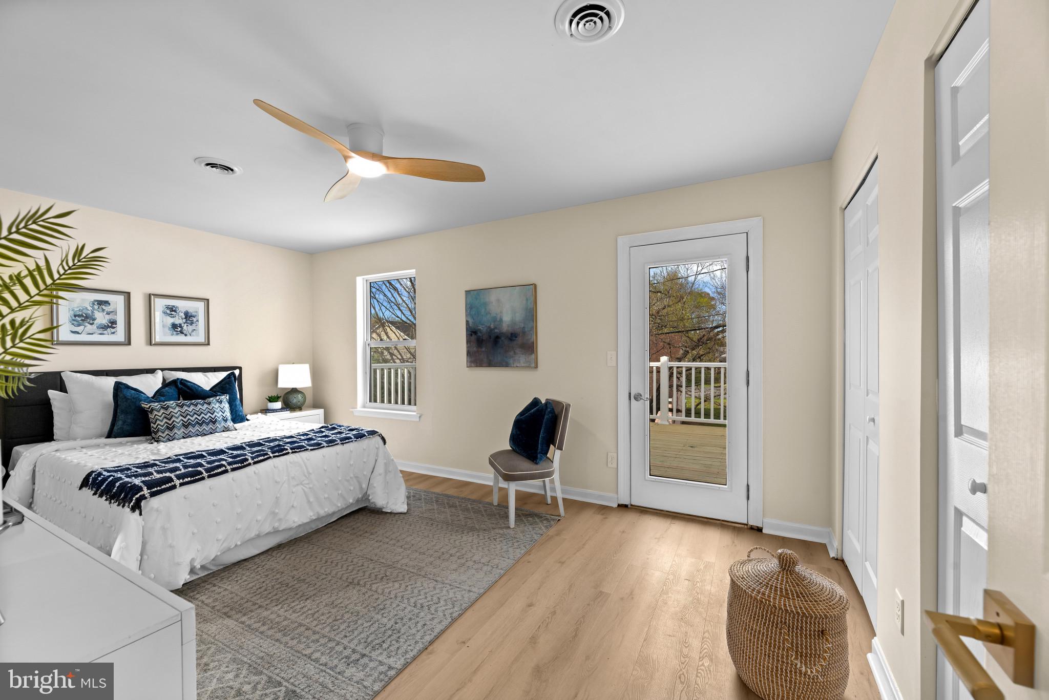 1512 Lincoln Road Shady Side, MD 20764 - Photo 10 of 42 a living room with a bed furniture and a window
