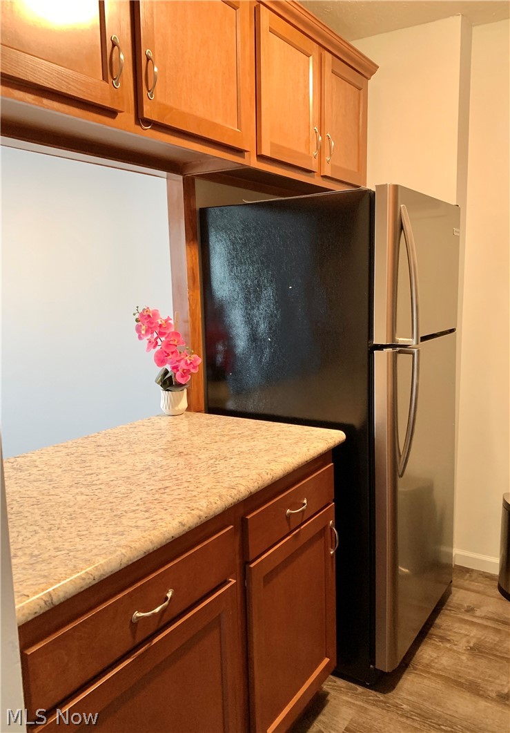Stainless steel appliances and pass through to the Great room.