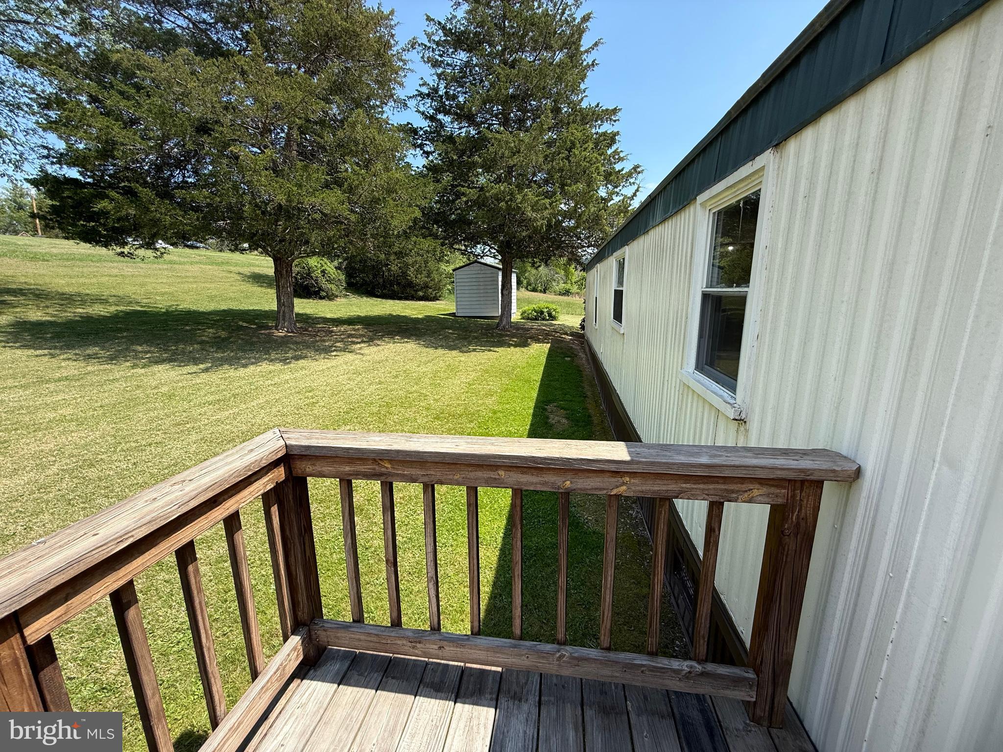 192 AA Rogers Road Augusta, WV 26704 - Photo 27 of 34 a view of outdoor space with deck and yard