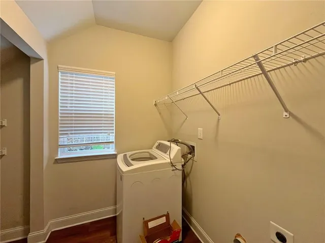 a view of a bathroom with a window