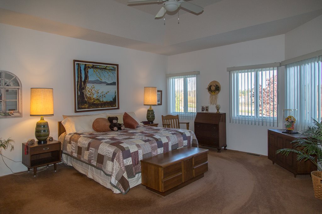 29 Lockheed Boulevard Waynesboro, VA 22980 - Photo 21 of 43 a bedroom with a bed and wooden floor