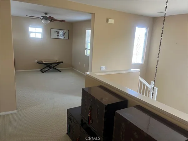 a view of livingroom with furniture and windows