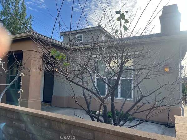 a house view with a street