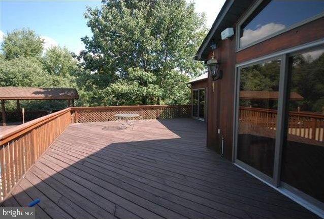505 Gun Road Halethorpe, MD 21227 - Photo 3 of 19 REAR DECK OVERLOOKS POOL AND GROUNDS
