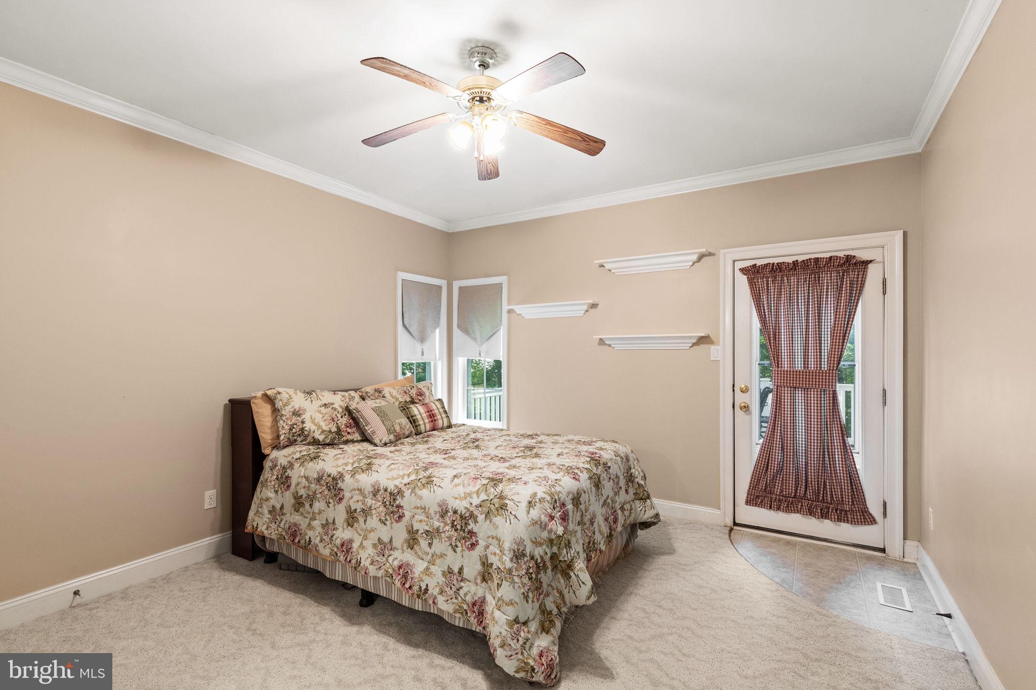 502 Stratford Road Fallston, MD 21047 - Photo 29 of 71 Main level bedroom with deck access