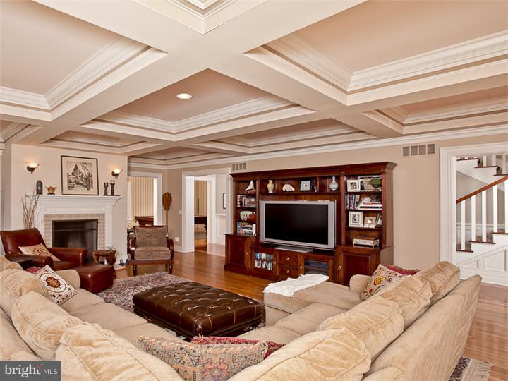 271 Edgerstoune Road Princeton, NJ 08540 - Photo 2 of 17 a living room with furniture a fireplace and a flat screen tv