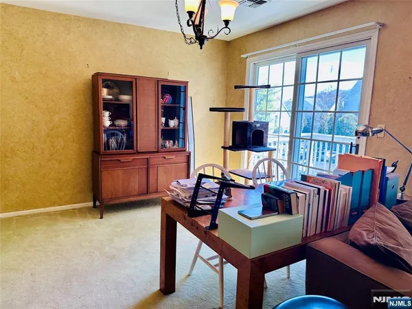 a view of a livingroom with furniture