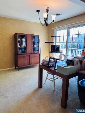 a view of a workspace with furniture