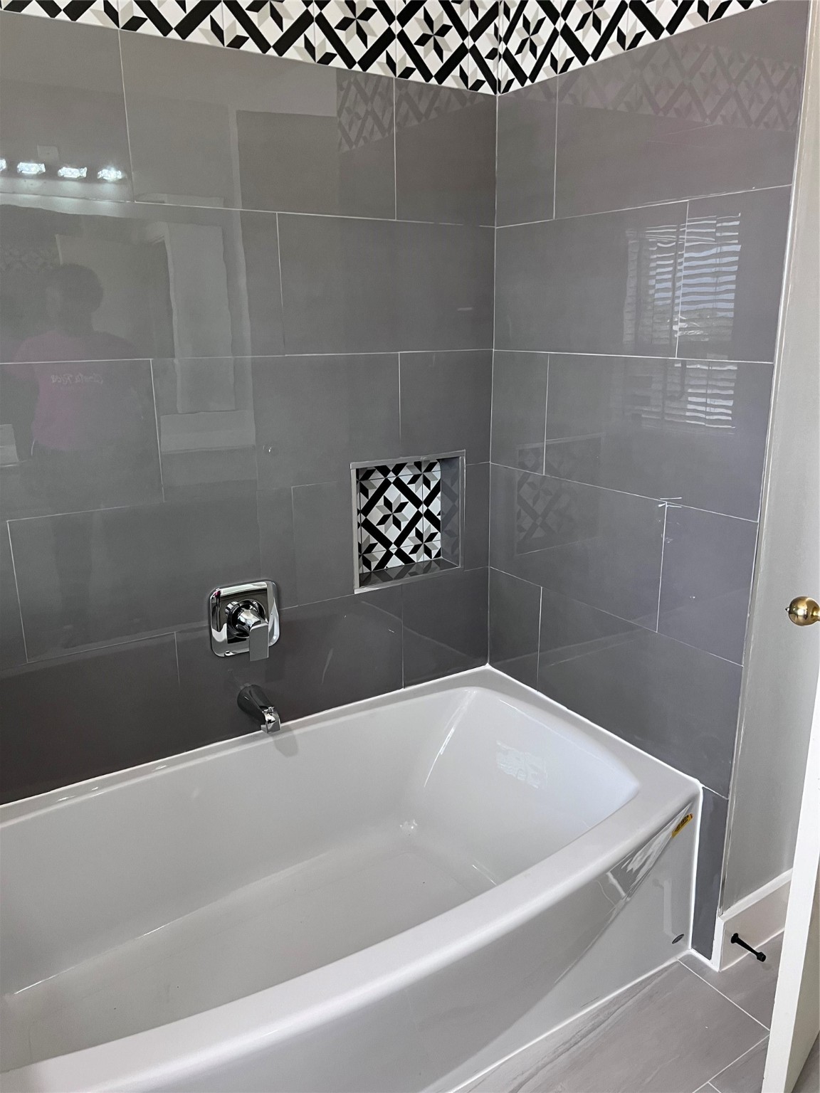 19818 Lindenwick Court Cypress, TX 77433 - Photo 15 of 35 a bathroom with a bathtub