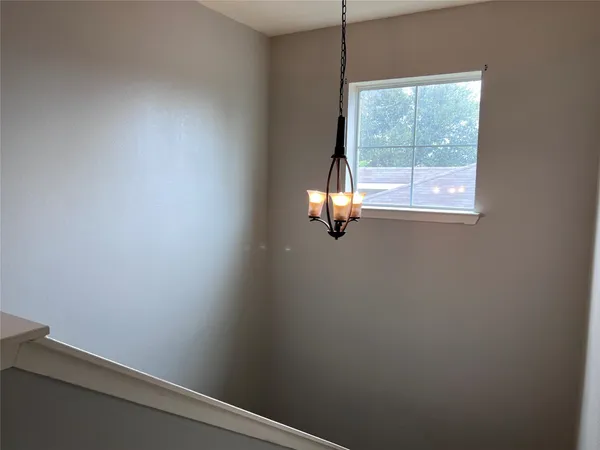 a bathroom with a bathtub and a toilet