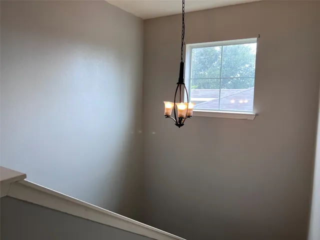 a bathroom with a bathtub and a toilet