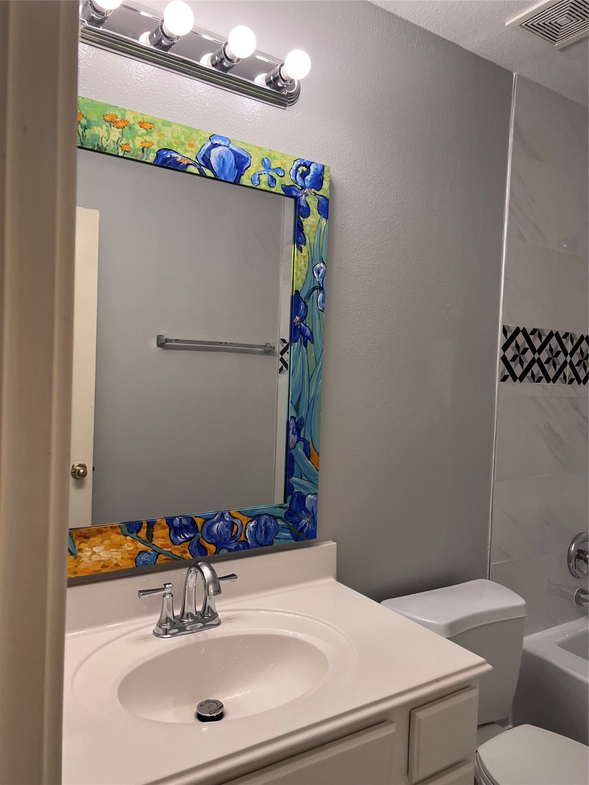 19818 Lindenwick Court Cypress, TX 77433 - Photo 21 of 35 a bathroom with a sink and a mirror