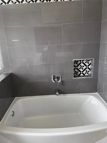 a bathroom with a bathtub