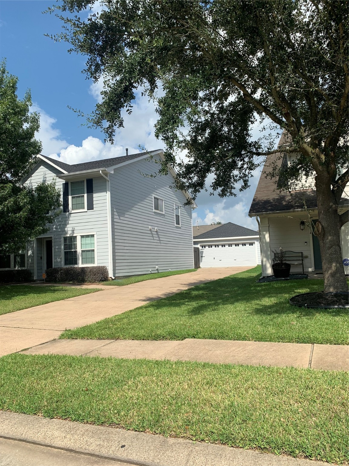 19818 Lindenwick Court Cypress, TX 77433 - Photo 34 of 35 a front view of a house with a yard and garage