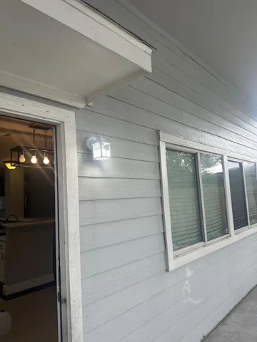 a view of hotel and patio