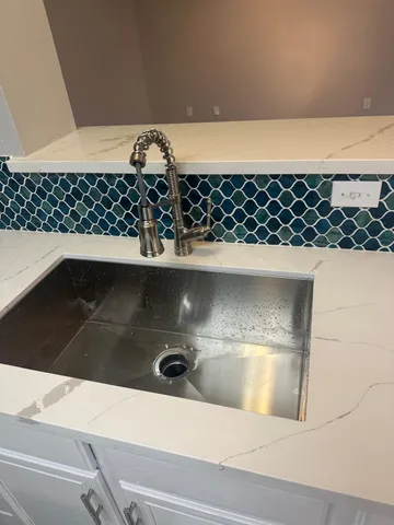 a close view of a sink in a bathroom