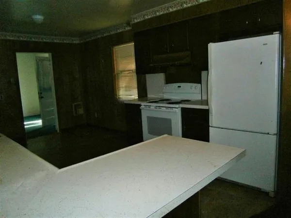 a bathroom with a sink toilet and vanity