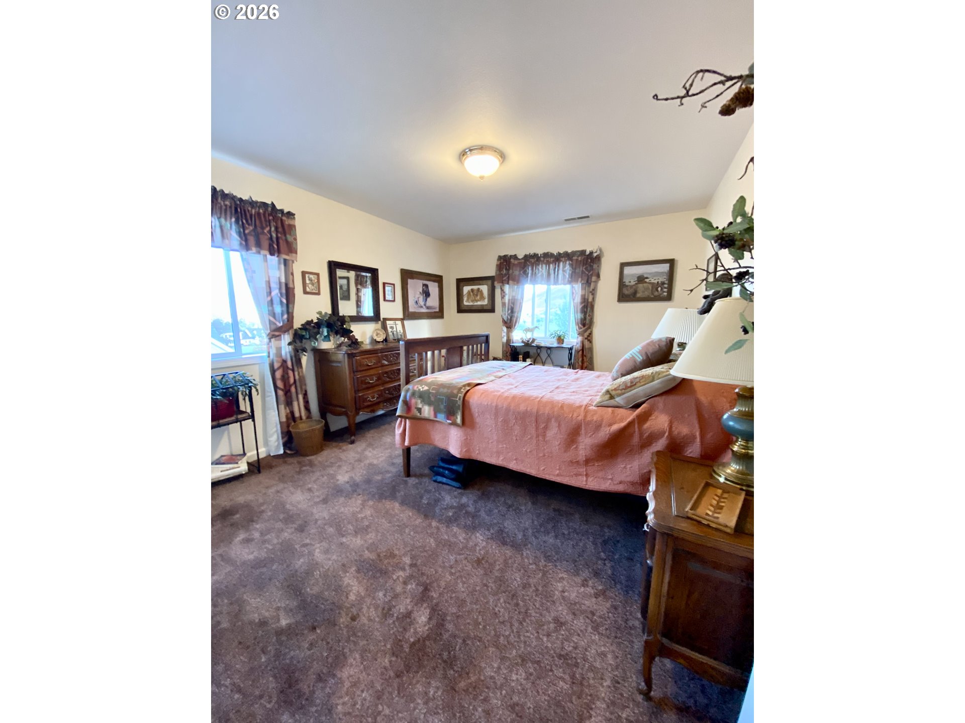 3555 Indiana Avenue Baker City, OR 97814 - Photo 22 of 43 a bedroom with a bed and a window
