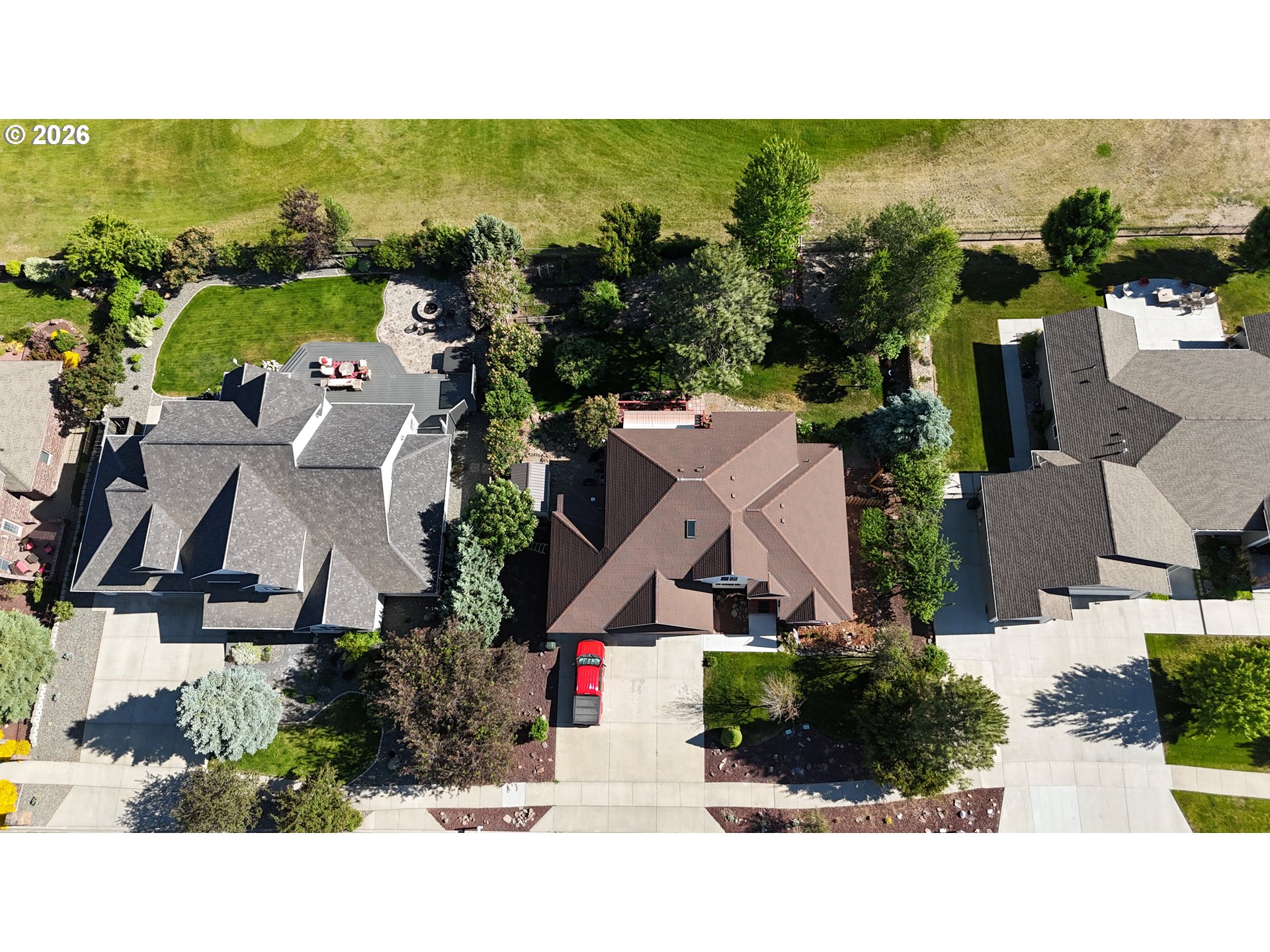 3555 Indiana Avenue Baker City, OR 97814 - Photo 25 of 43 an aerial view of a house with a yard pool seating area and yard