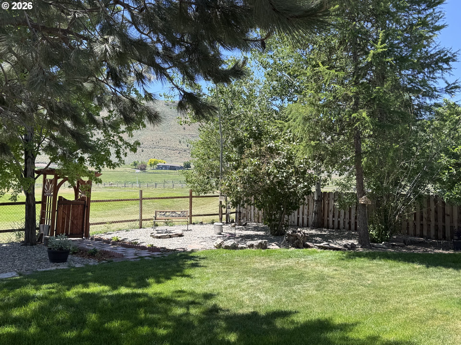 3555 Indiana Avenue Baker City, OR 97814 - Photo 31 of 43 a view of a garden with a tree