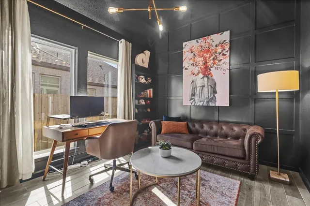 a workspace with furniture and window