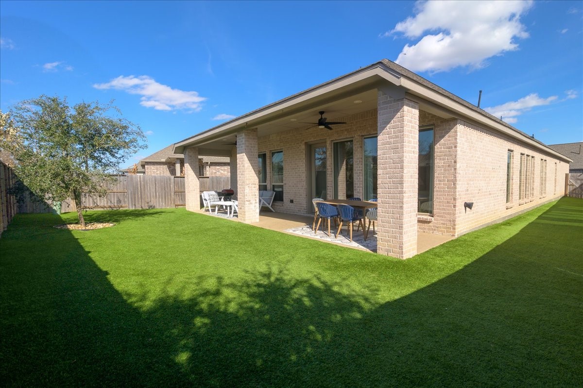 4910 Morrison Drive Manvel, TX 77578 - Photo 27 of 35 a view of a house with backyard and porch