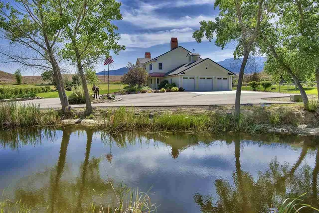 a house with trees in front of it
