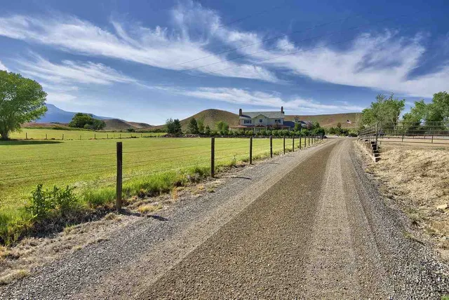 a view of a lake with a big yard