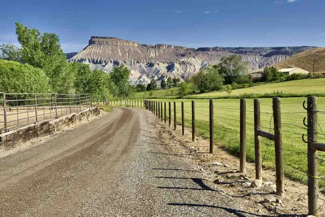 a view of a street with a ocean view