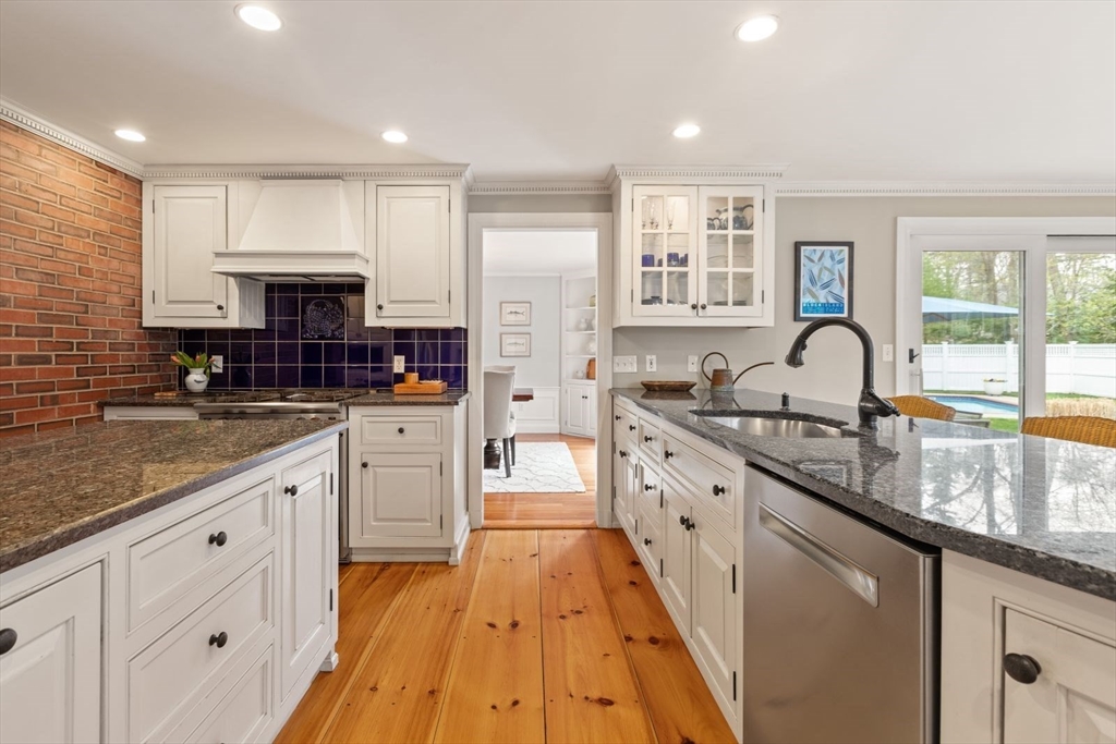 2 Yorkshire Road Dover, MA 02030 - Photo 11 of 42 a large kitchen with stainless steel appliances granite countertop a stove a sink and a granite counter tops