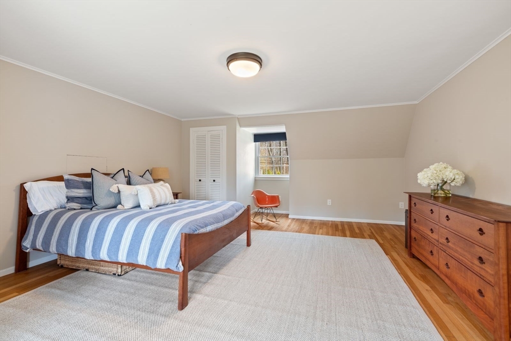 2 Yorkshire Road Dover, MA 02030 - Photo 23 of 42 a bedroom with a bed and a dresser