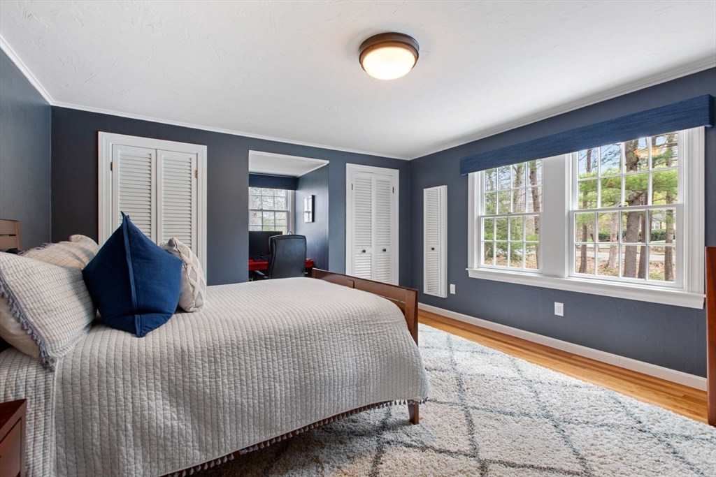 2 Yorkshire Road Dover, MA 02030 - Photo 27 of 42 a bedroom with a large bed and a large window