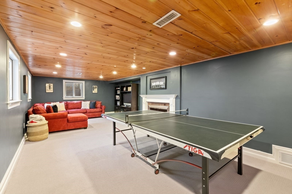 2 Yorkshire Road Dover, MA 02030 - Photo 30 of 42 a living room with stainless steel furniture pool table and a couch