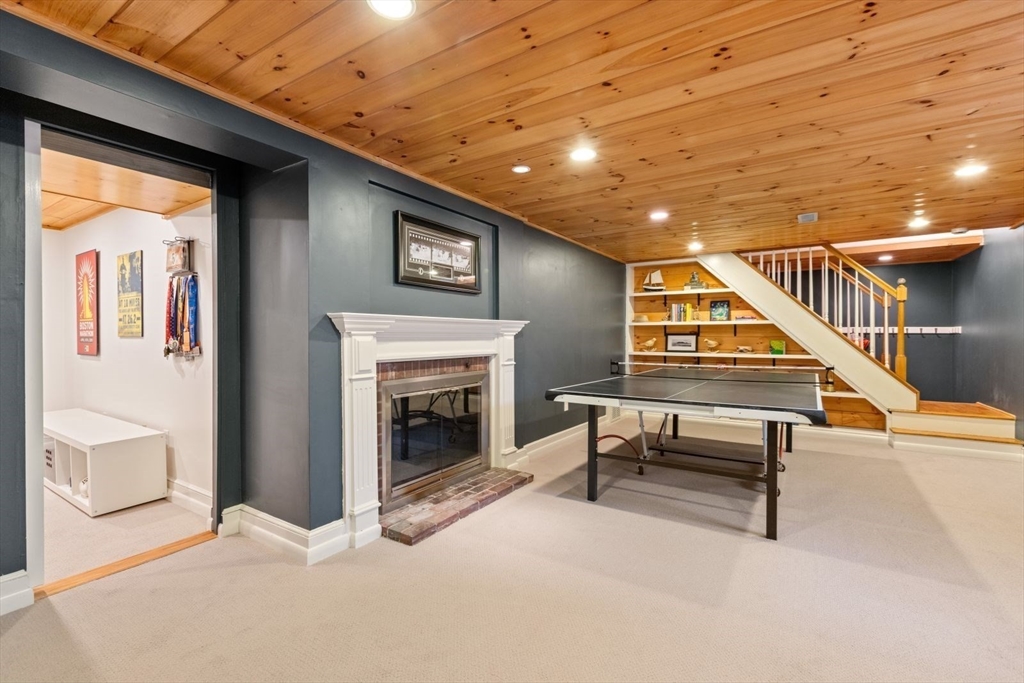 2 Yorkshire Road Dover, MA 02030 - Photo 32 of 42 a view of livingroom with furniture and a fireplace