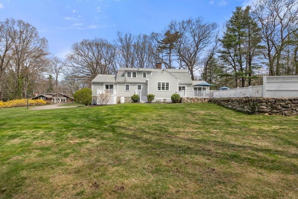 2 Yorkshire Road Dover, MA 02030 - Photo 38 of 42 a view of a white house with a big yard and large trees