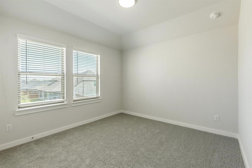 1117 Sunward Road Princeton, TX 75407 - Photo 20 of 34 an empty room with a window