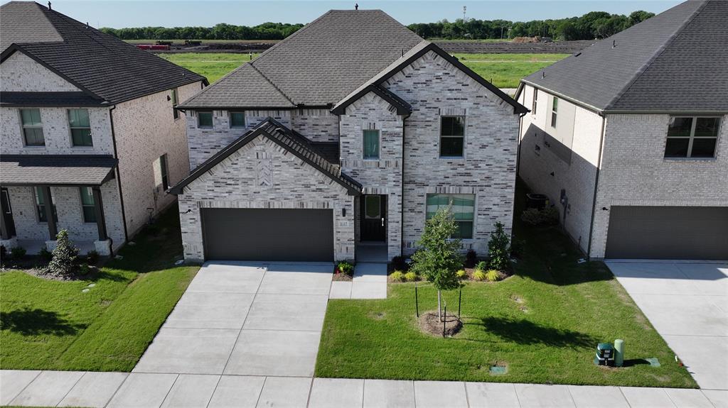 1117 Sunward Road Princeton, TX 75407 - Photo 2 of 34 a front view of a house with garden