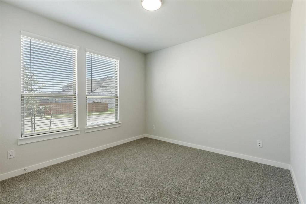 1117 Sunward Road Princeton, TX 75407 - Photo 21 of 34 an empty room with a window
