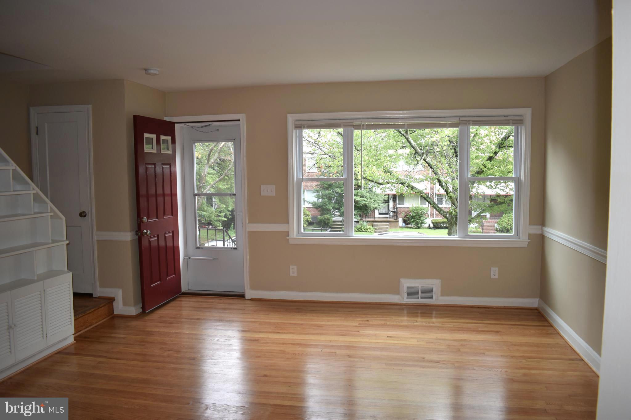 1619 Walterswood Road Baltimore, MD 21239 - Photo 3 of 34 Bright and Airy Living Room