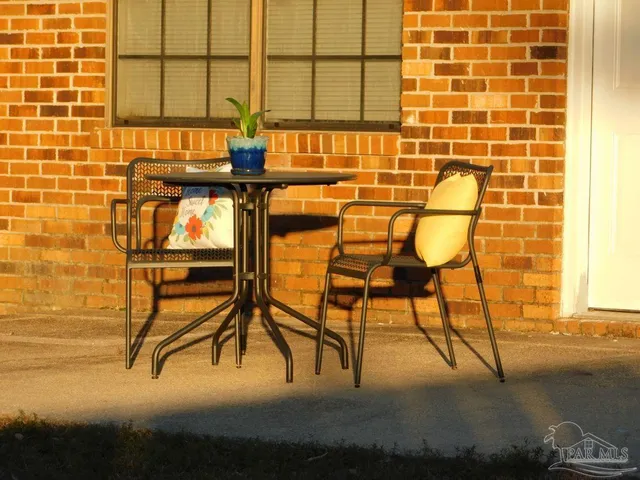 a view of a bathroom with a sink and a window