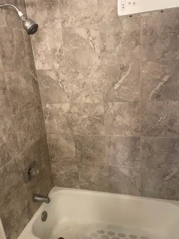a bathroom with a bathtub